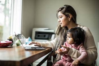 1 Artificial Intelligence (AI) Stock to Buy Hand Over Fist, and 1 to Avoid Before the 2024 Bull Market: https://g.foolcdn.com/editorial/images/756094/woman_working_laptop_with_an_infant.jpg