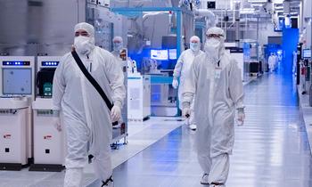 Intel Is Turning Its Foundry Business Into a Subsidiary. Time to Buy?: https://g.foolcdn.com/editorial/images/790994/inside-intel-factory-two-people-in-lab-gear-walking_intel.jpg