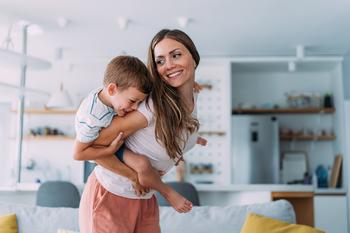 4 Midyear Financial Moves All Moms Should Make: https://g.foolcdn.com/editorial/images/738501/mom-with-son-gettyimages-1366137791.jpg