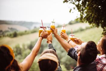 2 Stocks That Could Turn $1,000 Into $5,000 by 2030: https://g.foolcdn.com/editorial/images/782800/friends-toasting-while-drinking-beverages-outside.jpg