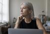 Doing These 3 Things Could Result in a Lower Social Security Benefit for Life: https://g.foolcdn.com/editorial/images/756609/older-woman-laptop-thoughtful-gettyimages-1578882963.jpg