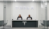 Elon Musk Is "Uncomfortable Growing Tesla to Be a Leader in AI and Robotics" Without This 1 Key Development Happening: https://g.foolcdn.com/editorial/images/761471/tesla-service-center-with-two-associates-at-desk-with-tesla-logo.png