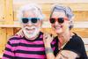 Is Bitcoin a Millionaire-Maker?: https://g.foolcdn.com/editorial/images/777138/flashy-seniors-couple-smiling.jpg