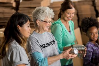 Worried You'll Blow Through Your Retirement Savings to Keep Busy? Consider This Instead: https://g.foolcdn.com/editorial/images/733275/older-woman-volunteer-gettyimages-623523134.jpg