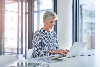 Claiming Social Security Early in 2024? Keep This Important Number in Mind: https://g.foolcdn.com/editorial/images/757694/older-woman-laptop-gettyimages-1152601629.jpg