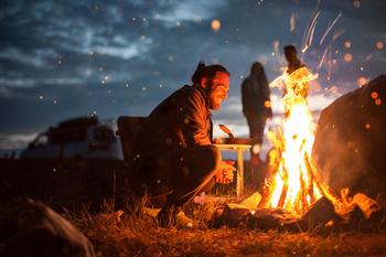 Can Yeti Stock Help You Become a Millionaire?: https://g.foolcdn.com/editorial/images/736559/bonfire-celebration-happy-joy-party.jpg