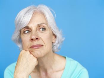 Now's the Time to Play Defense If You Have Retirement on the Horizon: https://g.foolcdn.com/editorial/images/693675/senior-woman-thinking-blue-background.jpg