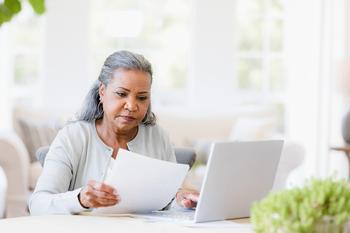 Going Back to Work in Retirement Could Impact Your Social Security Benefits -- for Better and for Worse: https://g.foolcdn.com/editorial/images/764790/older-woman-document-laptop-gettyimages-1391107082-1.jpg