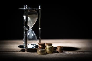 2 Dividend Stocks to Double Up on Right Now: https://g.foolcdn.com/editorial/images/782920/hourglass-and-coins.jpg