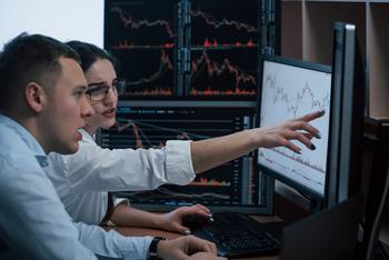 Why NextEra Energy Partners Stock Surged 29% in December: https://g.foolcdn.com/editorial/images/760681/two-persons-appearing-confused-while-studying-stock-price-charts-on-computer-screens.jpg