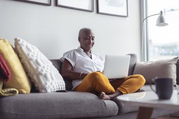 3 Signs You Should Absolutely Apply for Social Security in 2024: https://g.foolcdn.com/editorial/images/762686/senior-smiling-and-sitting-cross-legged-on-couch-using-laptop.jpg