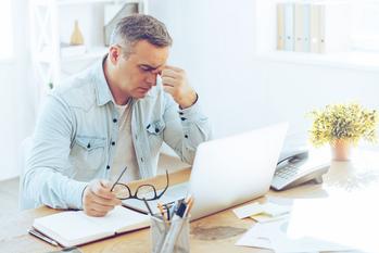 Are You Among the 37% of Workers Worried About Outliving Their Retirement Savings?: https://g.foolcdn.com/editorial/images/692103/mature-man-frustrated-upset-sitting-in-front-of-computer.jpg