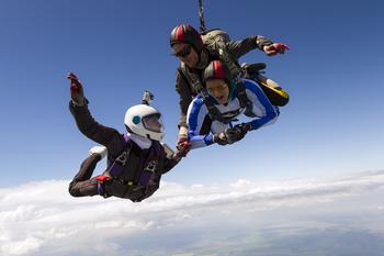 A Bull Market Is Coming: 1 Super Stock Down 96% You'll Wish You'd Bought on the Dip: https://g.foolcdn.com/editorial/images/744787/three-smiling-people-skydiving-together.jpg