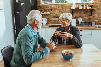 Married? Keep This Key Point in Mind When Claiming Social Security: https://g.foolcdn.com/editorial/images/743267/senior-couple-kitchen-table-gettyimages-1066987658.jpg