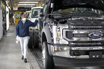 Where Will Ford's Stock Price Be in 2024?: https://g.foolcdn.com/editorial/images/760416/ford-ohio-assembly-plant-car-truck-factory-worker-source-ford.jpg