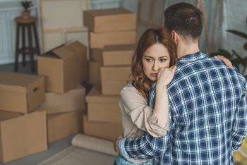 Why Real Estate Stocks Were Hurting Today: https://g.foolcdn.com/editorial/images/772555/person-looking-sad-while-hugging-partner-in-room-full-of-moving-boxes.jpg