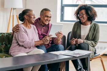 Want the Max $4,555 Social Security Monthly Benefit? 3 Things to Do Before Retirement: https://g.foolcdn.com/editorial/images/747906/three-people-sitting-at-a-table-looking-at-documents-and-a-tablet.jpg