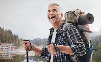 The Lesser-Known Reason You May Not Want to Delay Social Security: https://g.foolcdn.com/editorial/images/741501/older-man-backpacking-gettyimages-862209732.jpg