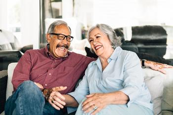A Bull Market Is Coming: 2 Dividend Stocks to Buy Now: https://g.foolcdn.com/editorial/images/721243/happy-older-couple-on-couch.jpg