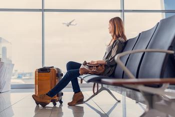 Is It Time To Sell Your American Airlines Stock?: https://g.foolcdn.com/editorial/images/779123/waiting-at-airport-luggage-plane-take-off.jpg
