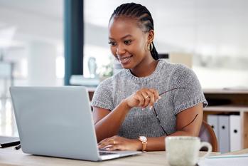 3 Warren Buffett Stocks to Buy During the Stock Market Sell-Off Without Any Hesitation: https://g.foolcdn.com/editorial/images/786481/woman-smiling-looking-at-laptop.jpg