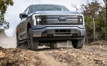 Should You Invest in Ford in 2024?: https://g.foolcdn.com/editorial/images/757055/ev-electric-truck-f-150-lightning-lariat-source-ford-_-image-source_-getty.jpg