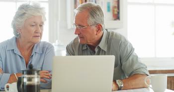 A 2025 Social Security COLA Estimate Is Here, But It May Be Useless Without This Number: https://g.foolcdn.com/editorial/images/776434/senior-couple-laptop-serious-gettyimages-1180121935.jpg
