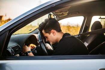 Why Carvana Investors Slammed on the Brakes Today: https://g.foolcdn.com/editorial/images/717989/person-with-head-on-car-steering-wheel.jpg