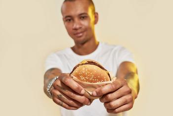 Why McDonald's Stock Flatlined on Wednesday: https://g.foolcdn.com/editorial/images/784535/person-displaying-a-hamburger.jpg