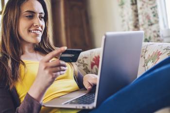 Where Will American Express Stock Be in 3 Years?: https://g.foolcdn.com/editorial/images/790253/happily-shopping-online-with-a-credit-card-laptop.jpg