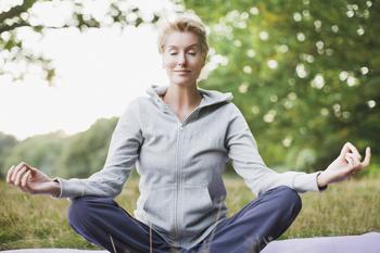 This Is the Best Way to Save for Retirement in Your 50s: https://g.foolcdn.com/editorial/images/738390/mature-woman-meditating-calm.jpg