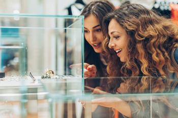 Why Signet Jewelers Stock Fell Today: https://g.foolcdn.com/editorial/images/695395/slide-4-two-women-admiring-jewelry-source-getty.jpg