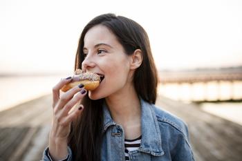 Why Krispy Kreme Was Such a Tasty Stock This Week: https://g.foolcdn.com/editorial/images/721379/young-person-enjoying-a-donut.jpg