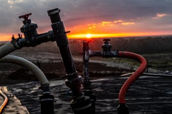 Kinder Morgan Is Diving Deeper Into Renewable Energy: https://g.foolcdn.com/editorial/images/691299/methane-piples-at-a-landfull-with-the-sun-setting-in-the-background.jpg