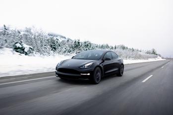 1 Stock-Split Stock Set to Join Apple, Microsoft, Amazon, and Alphabet in the $1 Trillion Club: https://g.foolcdn.com/editorial/images/735992/a-black-tesla-car-driving-on-an-open-road-in-the-snow.jpg