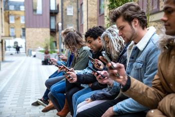 WhatsApp Could Be a Major Source of Growth for Meta: https://g.foolcdn.com/editorial/images/738130/gettyimages-group-smartphones.jpeg