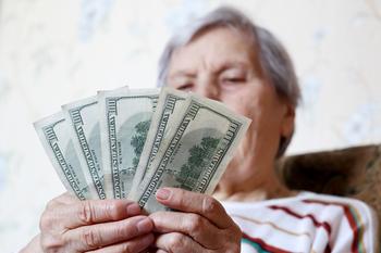 Here's the Average Social Security Retired Worker Benefit for Every Year Since 1950: https://g.foolcdn.com/editorial/images/759154/elderly-woman-retirement-social-security-holding-one-hundred-dollar-bills-cash-getty.jpg