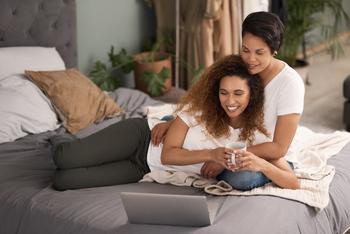 There's a Lot to Like About Disney, But There's No Easy Fix for This Problem: https://g.foolcdn.com/editorial/images/718881/22_04_21-two-people-in-a-bed-looking-at-a-computer-_gettyimages-1325853699.jpg