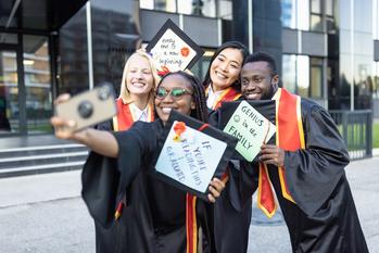 This Ultra Cheap Lending Stock Is Up 21% in June. Is It a Buy?: https://g.foolcdn.com/editorial/images/736664/students-after-graduation-ceremony-taking-selfie.jpg