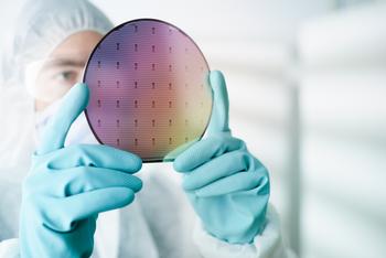 Will ASML Be Worth More Than Apple by 2030?: https://g.foolcdn.com/editorial/images/770814/man-chip-wafer.jpg