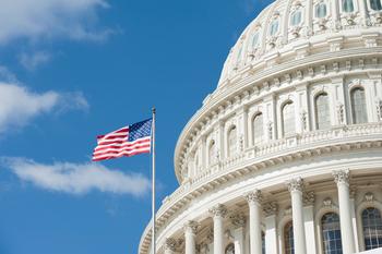 Tim Walz Stocks: Why 99 Million Americans Have the Same Portfolio as the VP Candidate: https://g.foolcdn.com/editorial/images/789232/the-capitol-dome-with-a-flag-next-to-it.jpg