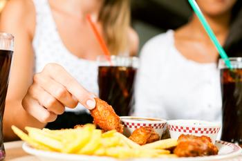 Why Wingstop Stock Was Flying Higher This Week: https://g.foolcdn.com/editorial/images/753594/slide-5-women-eating-chicken-wings.jpg