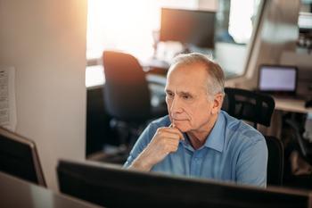 Best Semiconductor Stock: Intel Stock vs. Micron Stock: https://g.foolcdn.com/editorial/images/769998/older-man-serious-expression-at-computer.jpg