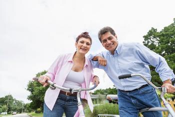 If You're Receiving Social Security Benefits, Get Ready for a Record Increase in 2023: https://g.foolcdn.com/editorial/images/694032/active-retirement-ride-bike-happy-couple.jpg