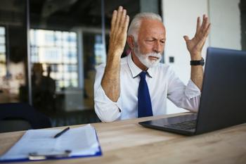 Burned Out at Work? Before You Claim Social Security and Retire Early, Consider This: https://g.foolcdn.com/editorial/images/767198/older-man-laptop-annoyed-gettyimages-1062933262-1.jpg