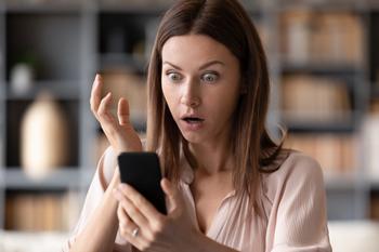 2 Colossal Stocks to Buy on the Dip in 2023: https://g.foolcdn.com/editorial/images/719675/shocked-woman-looking-at-mobile-phone-screen.jpg