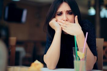 Why Lamb Weston Stock Was Plummeting This Week: https://g.foolcdn.com/editorial/images/784753/person-obviously-not-enjoying-the-food-they-are-eating-in-a-restaurant.jpg