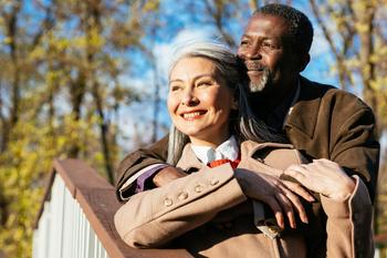 2 Steps to Claiming the $4,873 Max Monthly Social Security Benefit: https://g.foolcdn.com/editorial/images/762591/retired-interracial-couple-hugging-in-love.jpg