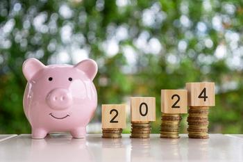 Study: 2/3 of Americans Plan to Make a Financial New Year's Resolution. Mine Is to Buy More of These 2 Stocks.: https://g.foolcdn.com/editorial/images/757765/piggy-bank-and-blocks-spelling-2024.jpg