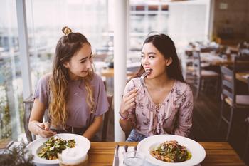 Is Cava Beating Chipotle at Its Own Game? 3 Things Investors Should Know Before Buying Either of These Stocks: https://g.foolcdn.com/editorial/images/788667/2-people-eating-at-a-restaurant.jpg